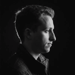 Nicholas Adamou in profile